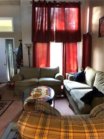 Great room with lots of windows and vaulted ceilings