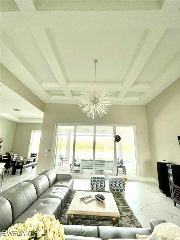 Living room featuring coffered ceiling, a notable
