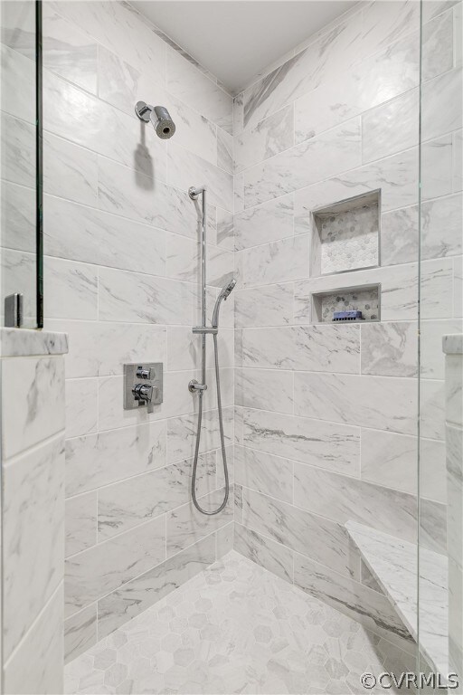 Bathroom featuring tiled shower