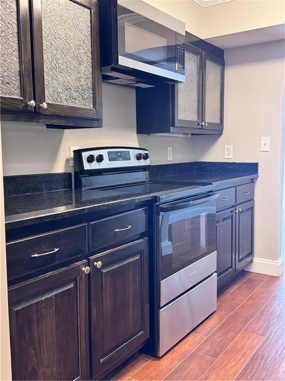 Kitchen featuring stainless steel appliances and light wood-type flooring