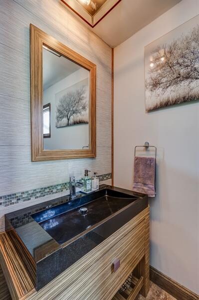 This updated powder room is located right off the 