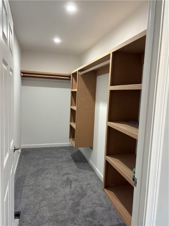 Walk-in closet in the primary suite.