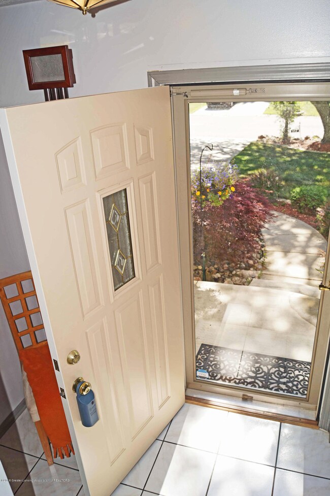 317 Honeysuckle Ln, Lansing, MI 48917 - photo 4