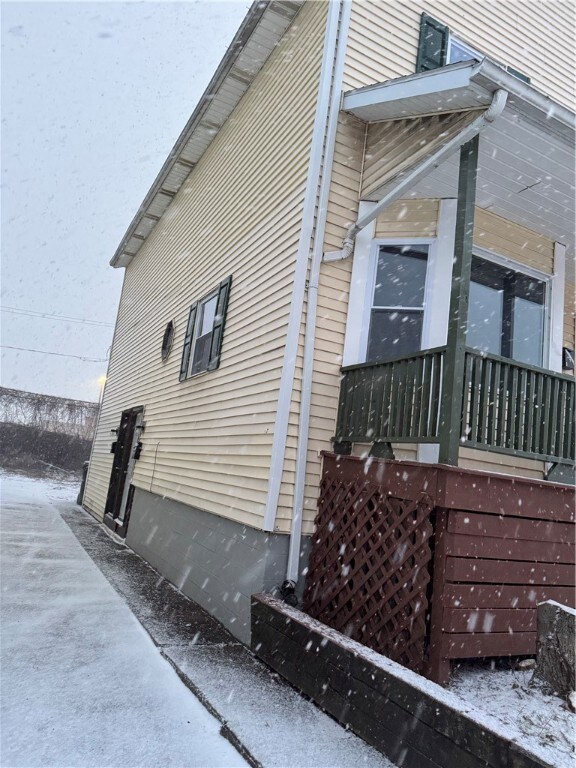 Left side of the property.