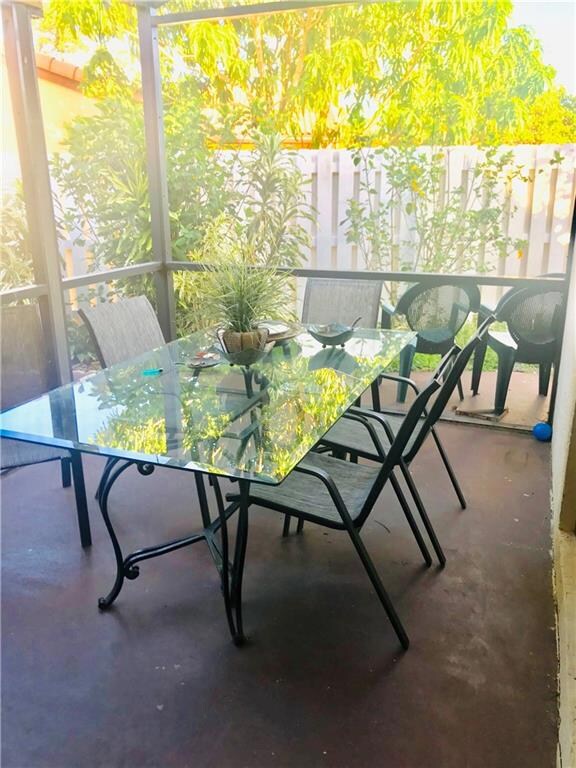 Screened Patio with wrap around out door extended