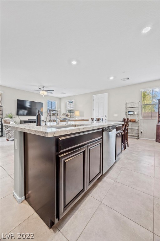 Eat in kitchen with neutral gray porcelain tile