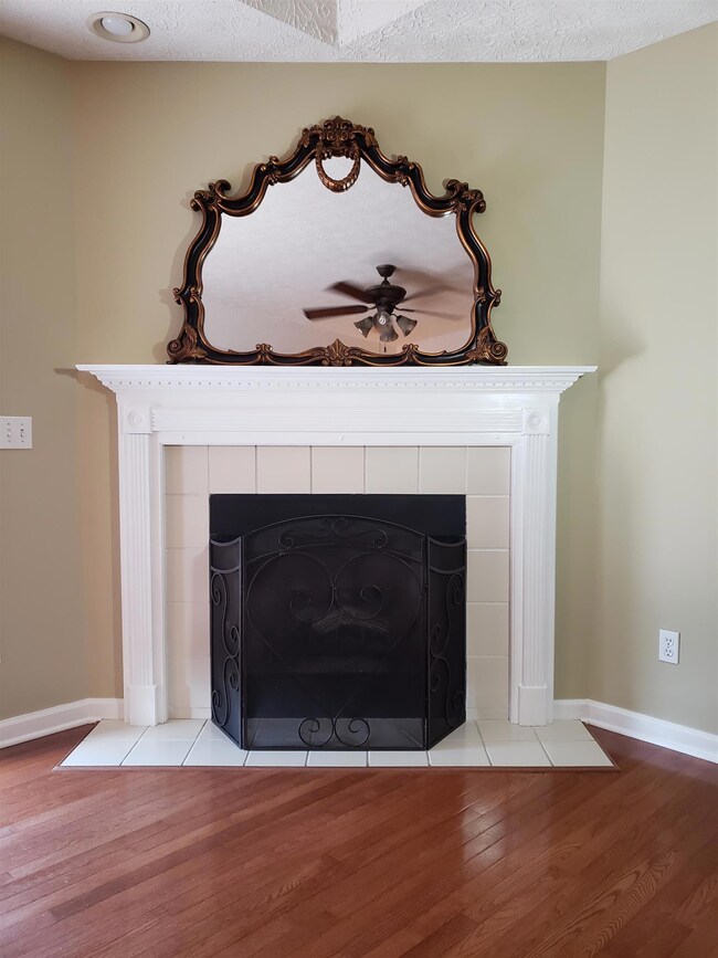 The fireplace and mantel in the Living Room