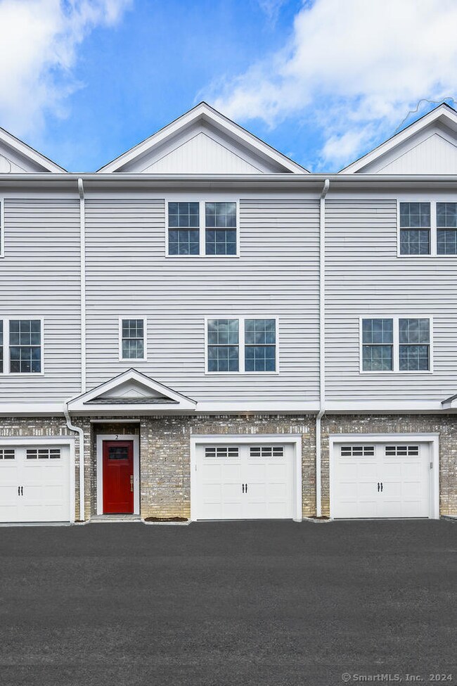 Each townhouse has a private single car garage.