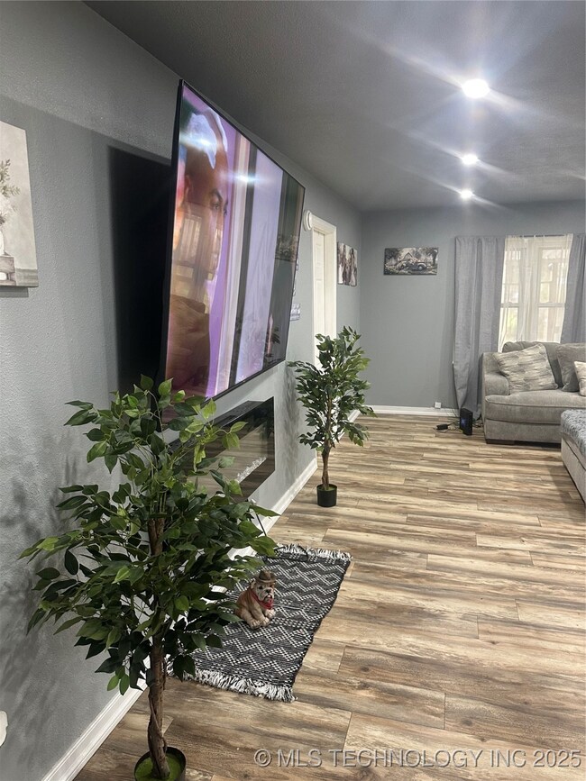 ENTERING INTO THE OPEN LIVING ROOM