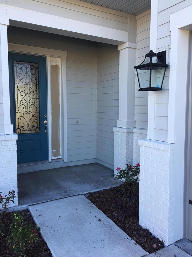 Front Door & Painted Brick