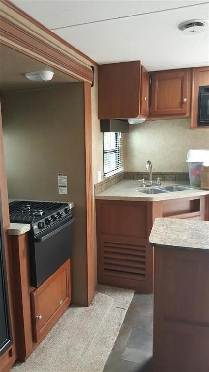 Gas oven and stove in back slide