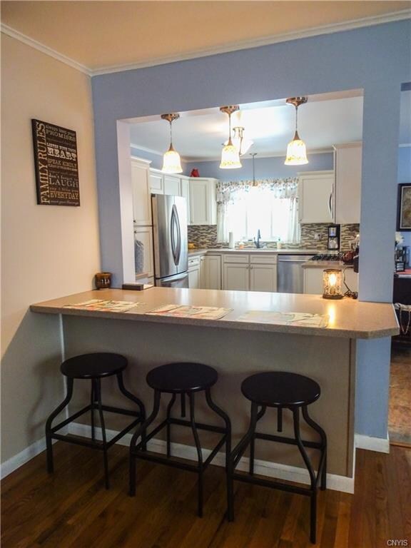 On this end of the kitchen is this cozy breakfast 