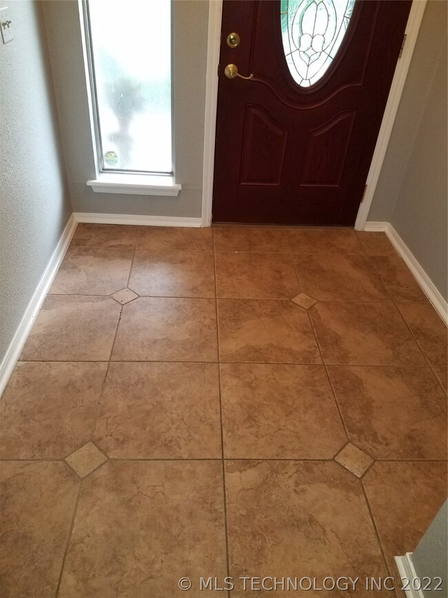 Beautiful Ceramic Tile Floors in Entry, Kitchen Di