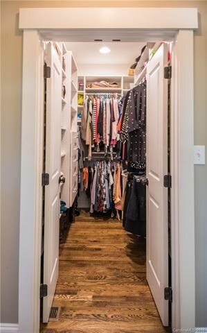 One of two master walk in closets