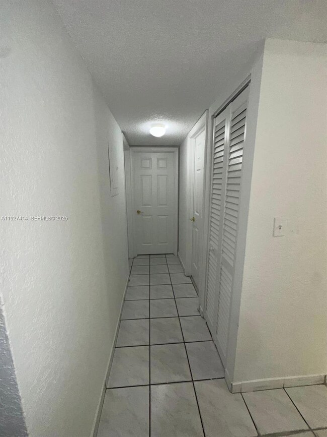 Westland Gardens unit 308, Hialeah, FL 33012 - photo 7
