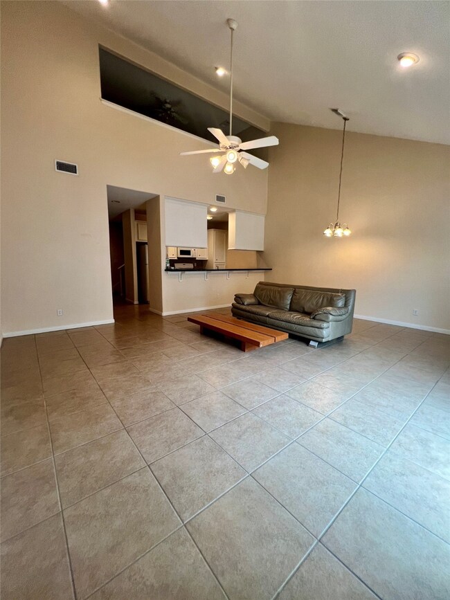 Spacious, well-lit living area.