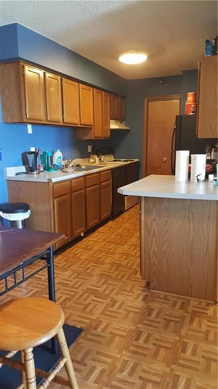 Lots of cabinet space with nice size dining area.