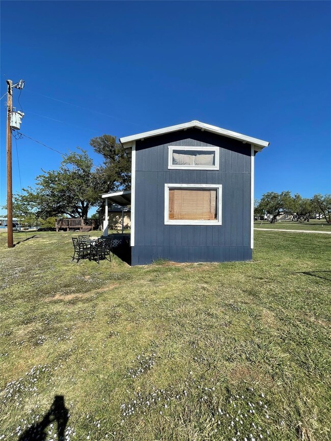 West end of the cabin with picture windows in the 