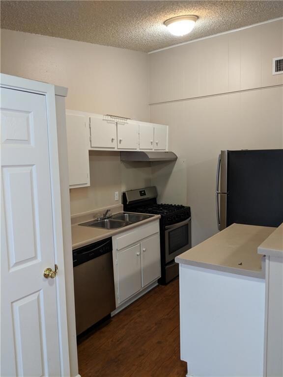 Kitchen featuring appliances with stainless steel