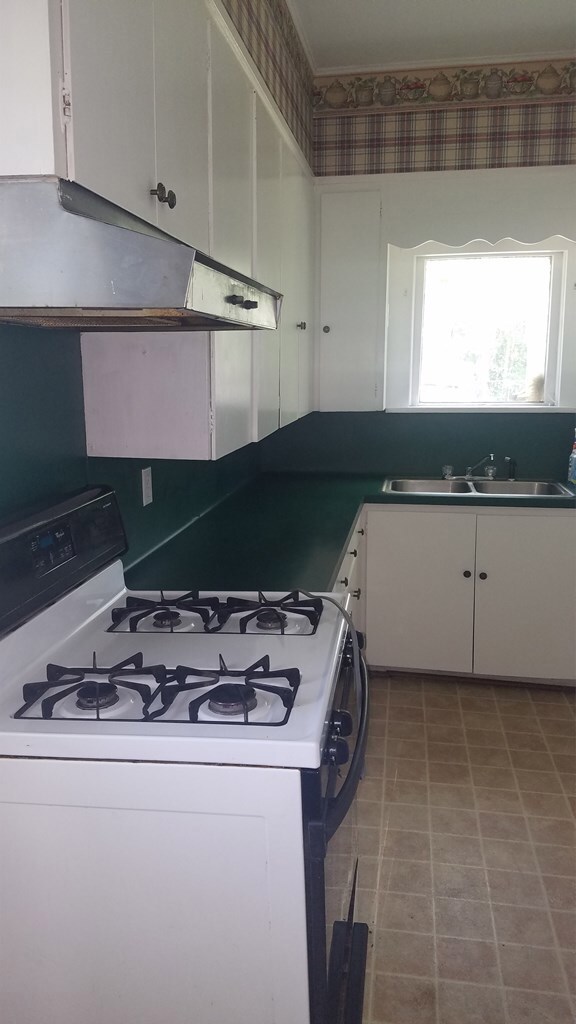 Kitchen with outside, side entrance