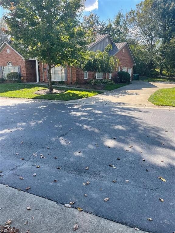 Large driveway. End Unit.