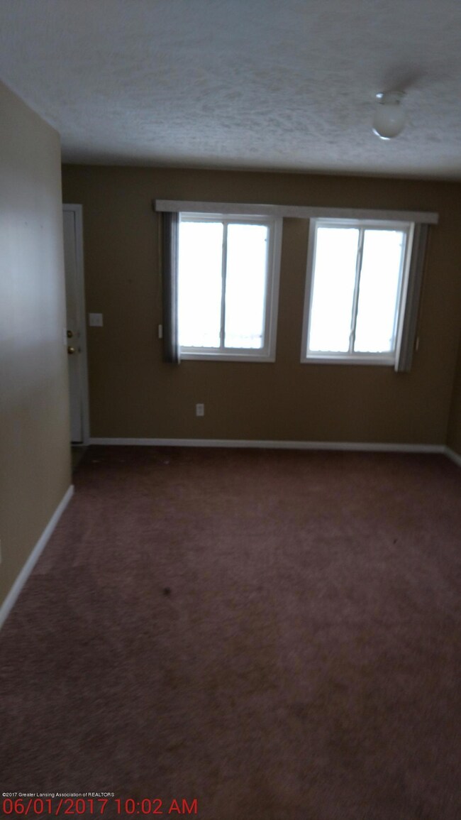 703 W Cavanaugh Rd, Lansing, MI 48910 - photo 3