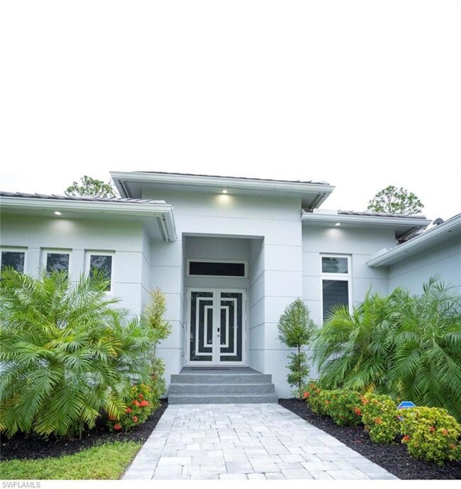 544 31st St SW, Naples, FL 34117 - photo 2