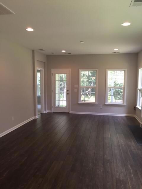 Russell family room wooded backyard