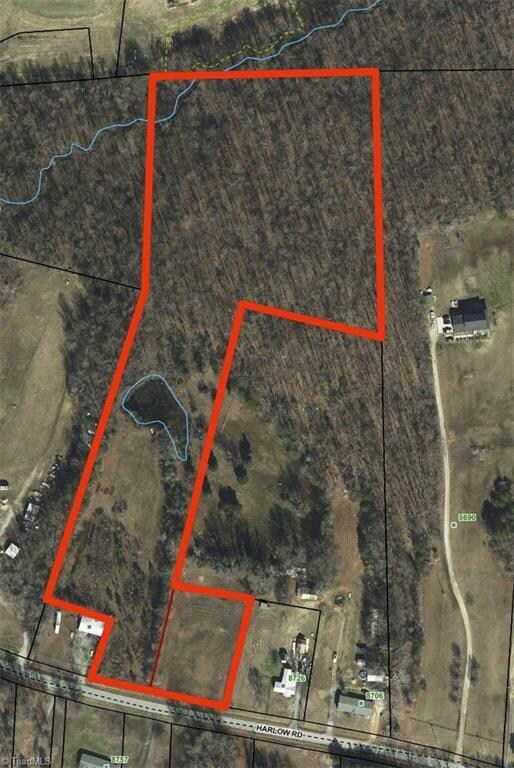 11.8 Acres with pond, beautiful hardwoods and some open area for potential pasture!