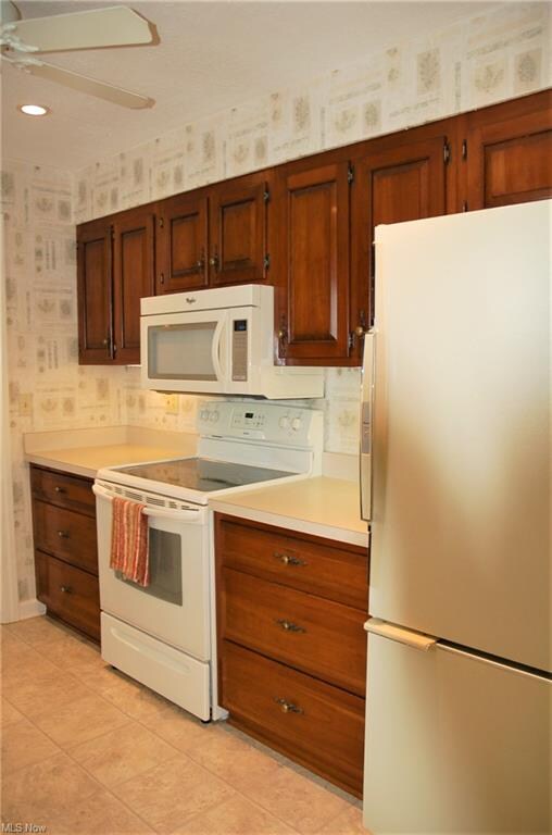 OPPOSITE WALL IN KITCHEN CUSTOM CABINETS, CEILING 