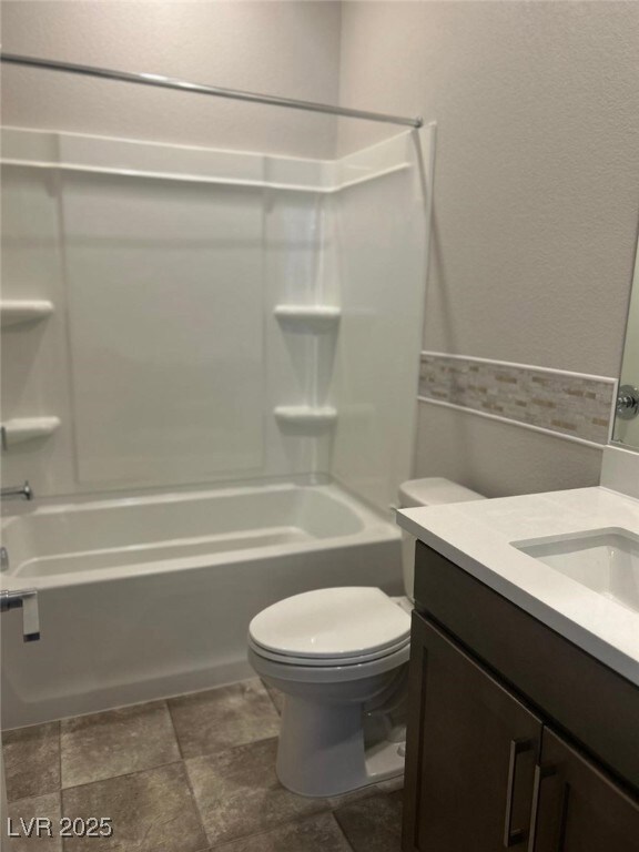 Full bath featuring shower / bathtub combination,