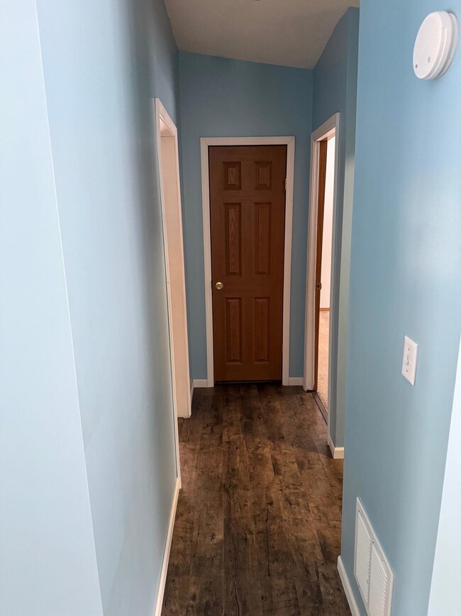 Hallway to bedrooms and bathroom