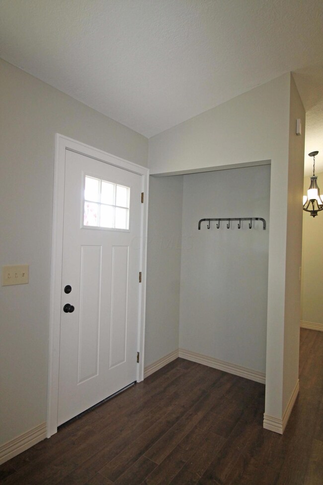 Foyer with guest closet