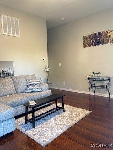 Living room featuring hardwood / wood-style floors