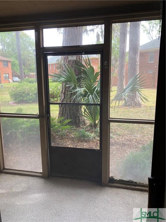 Small back porch area leading to the back court ya