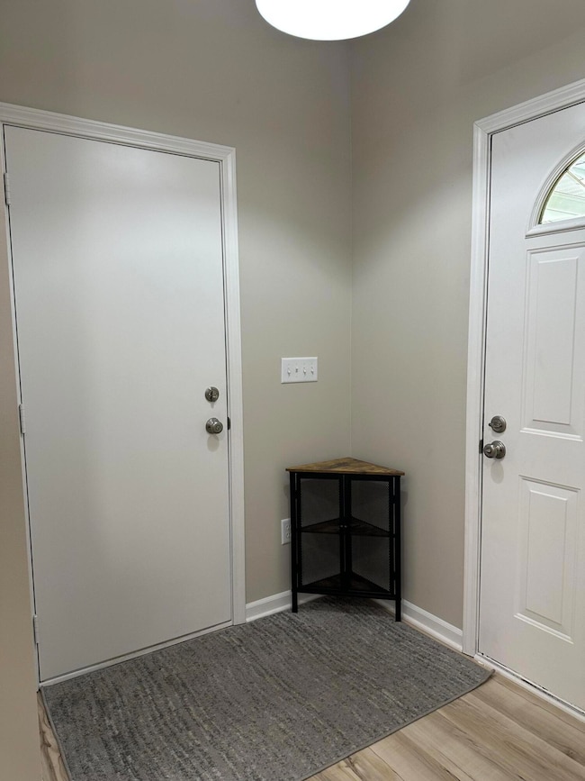 Entryway and door to garage