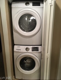 Laundry room featuring laundry area and stacked wa
