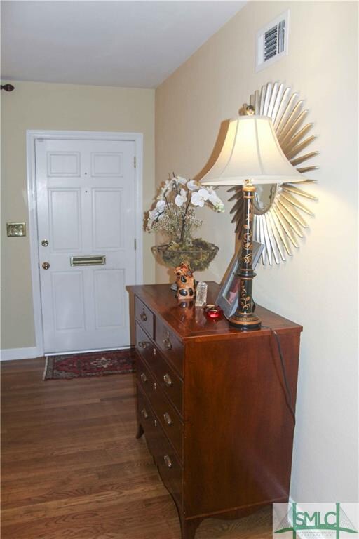 View of the front door from the living room.