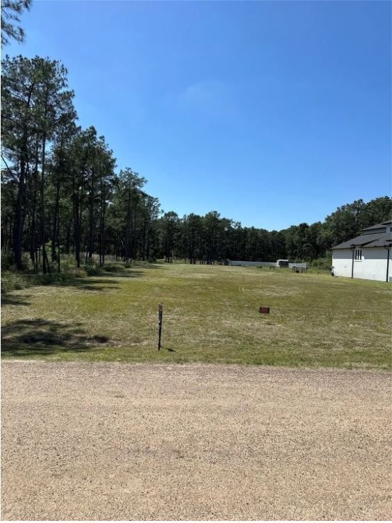 1 acre lot in a desirable acreage home community.