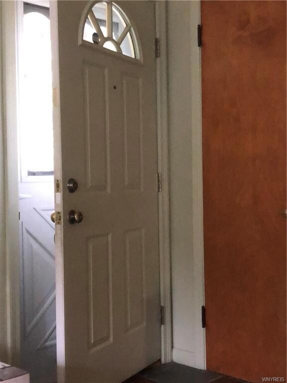 FRONT ENTRY, GUEST CLOSET - SLATE FLOOR