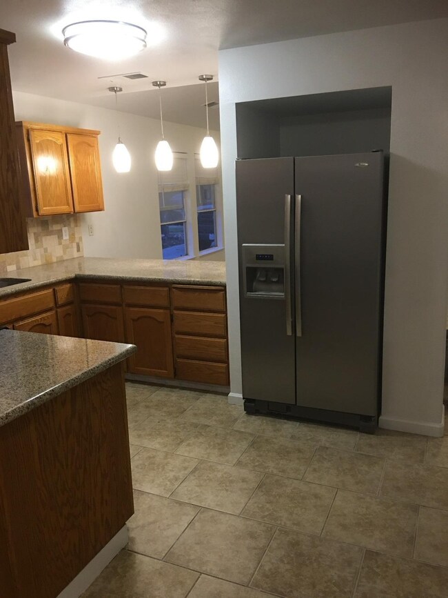 Kitchen with stainless steal appliances.