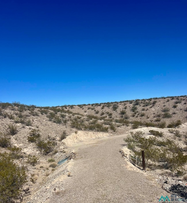 View of road featuring a rural view and view of desert