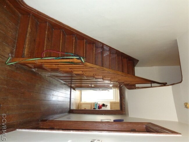 Foyer leading to the kitchen with original heart o