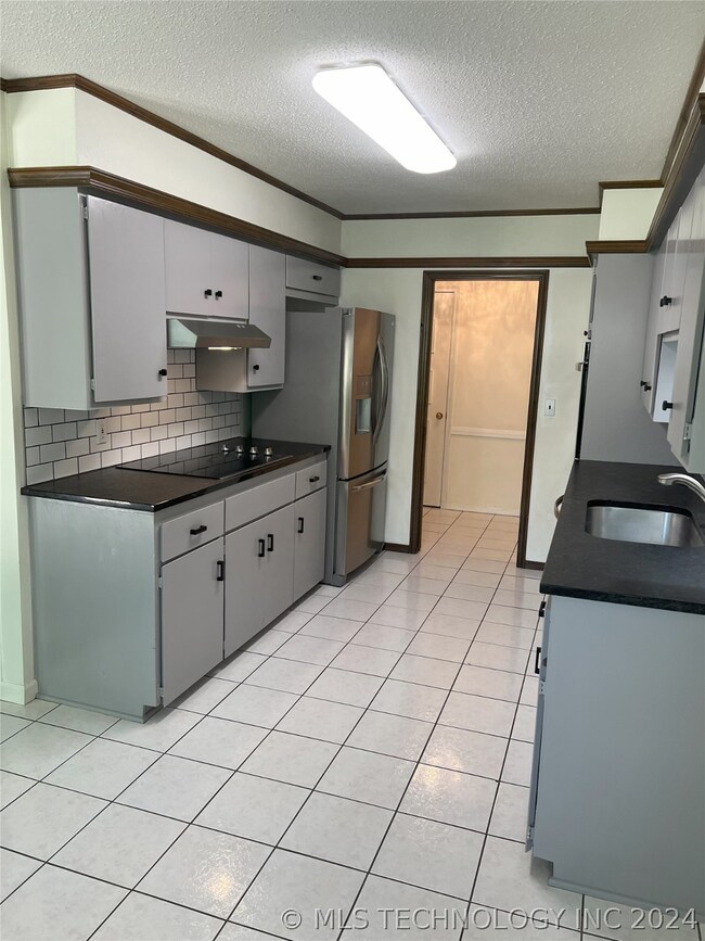 7027 E 71st Ct, Tulsa, OK 74133 - photo 6