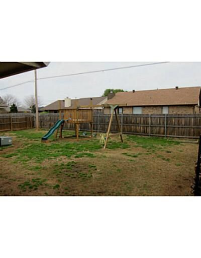 Exterior Back. Back yard view 1