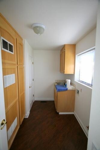 Inside laundry room w/storage