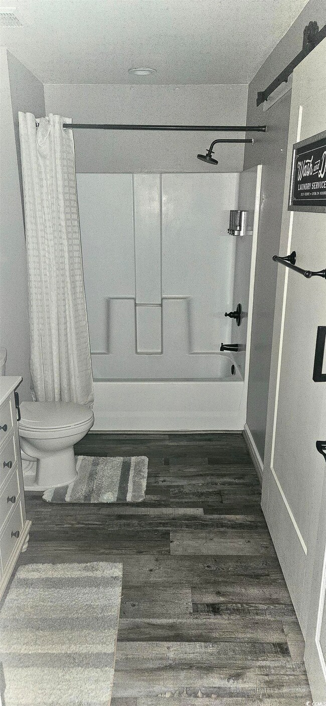 Full bath with shower / bathtub combination with c
