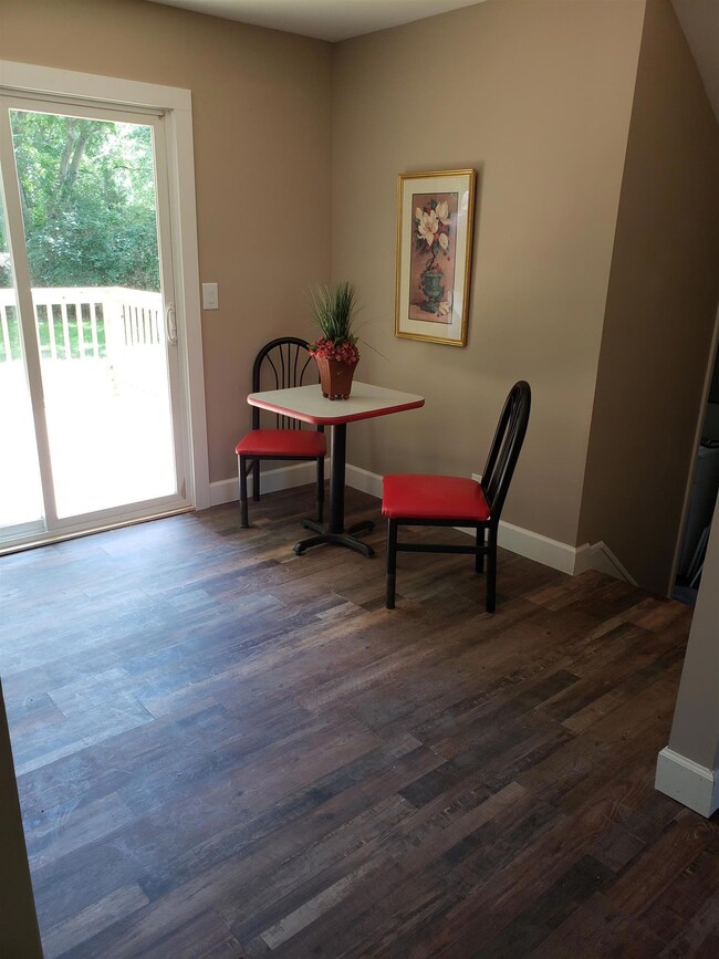 View of Beautiful New Plank Flooring In Kitchen
