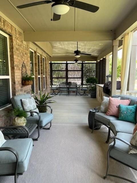 Extensive covered patio with more around the back 