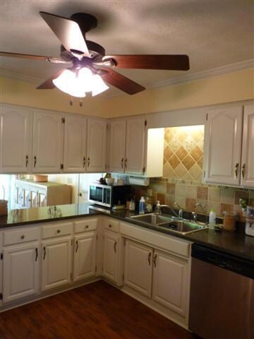 Large Kitchen with Tons of Cabinet Space & beautiful counter tops and tile back splashes